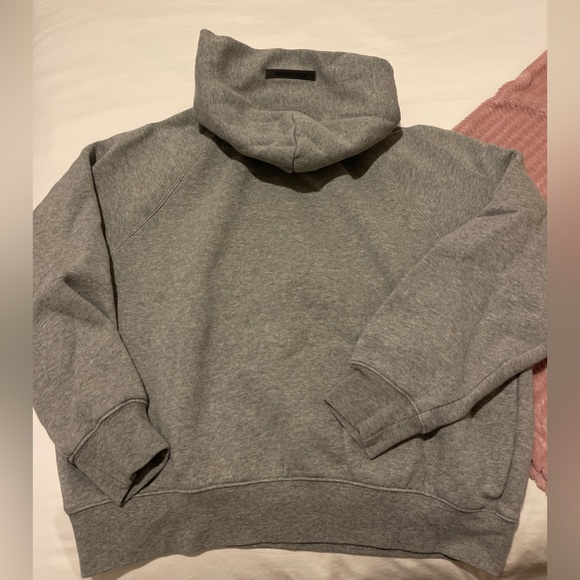 Fear of God Essentials Pullover Hoodie
Dark Heather Oatmeal - Picture 2 of 3